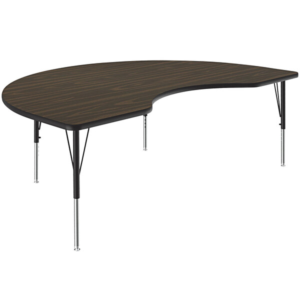 A Correll Kidney-shaped Activity Table with a curved surface.