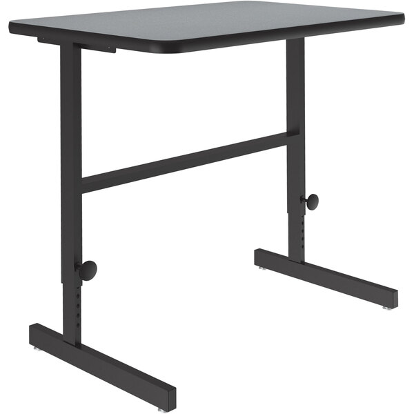 A gray rectangular Correll standing height work station with black legs.