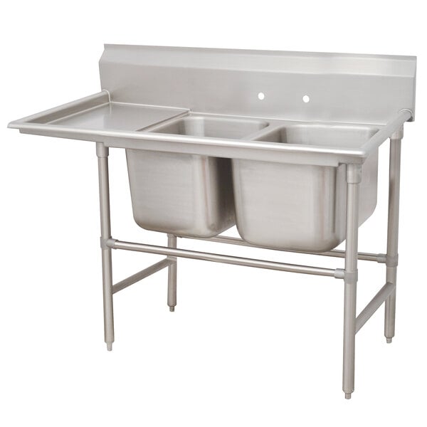 An Advance Tabco stainless steel two compartment pot sink with a left drainboard.