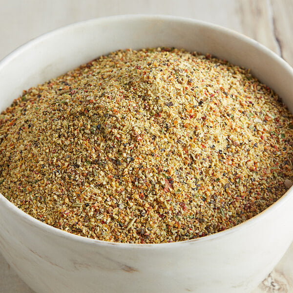 A bowl of McCormick Perfect Pinch Salt-Free Signature Seasoning Blend on a table.