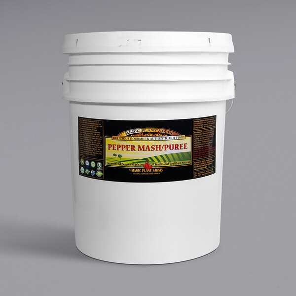 A white bucket with a label for Fiery Farms Green Jalapeno Pepper Mash.