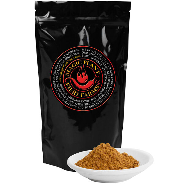 A black bag of Fiery Farms Red Devil's Breath pepper powder with a bowl of brown powder.