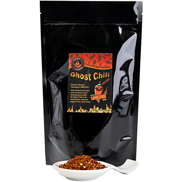A black bag of Fiery Farms Red Ghost Pepper Flakes with a label.