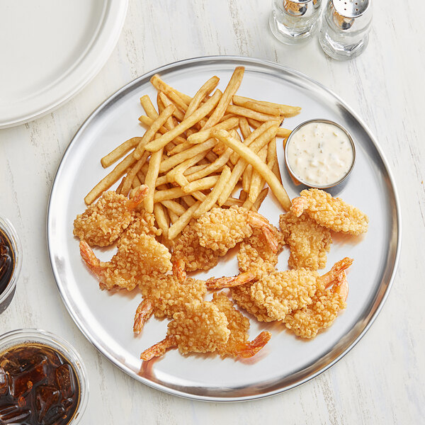 A Choice aluminum tray with fried shrimp and fries on a table with a glass of coke.