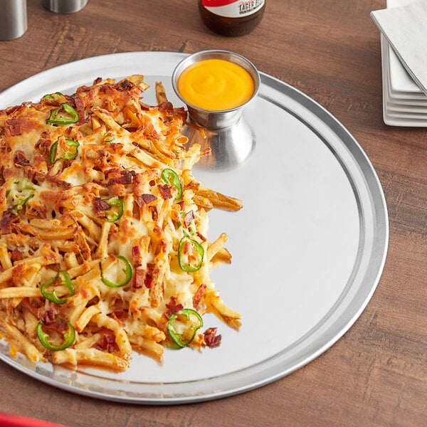 A Choice aluminum tray with a plate of loaded fries.