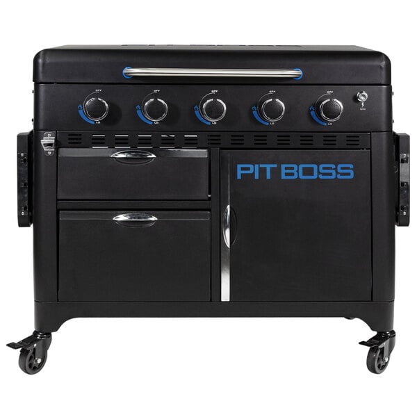 A black Pit Boss gas griddle with blue lettering and a cabinet.