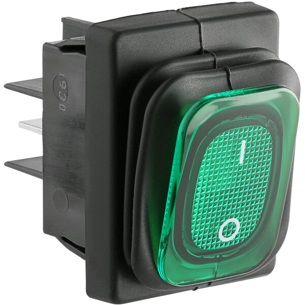 An Avantco green on/off switch with white text on a black background.