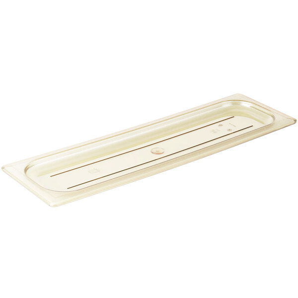 A Cambro H-Pan 1/2 size long amber plastic lid with a rectangular handle.
