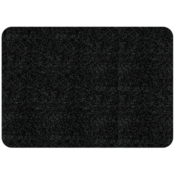 A black rectangular WizKid restroom mat with white specks.