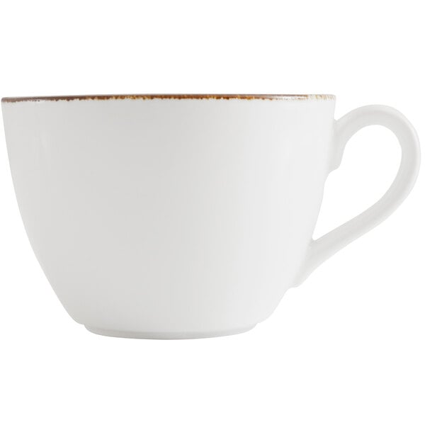 A Fortessa bright white china cup with a brown rim.