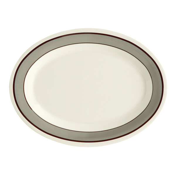 A white oval platter with a grey diamond border.