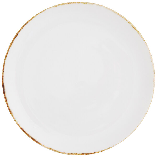 A Fortessa Salt china coupe plate with a white background and a gold rim.