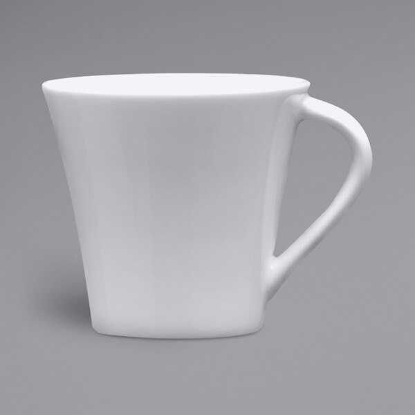 A Fortessa Tavola white porcelain espresso cup with a handle.
