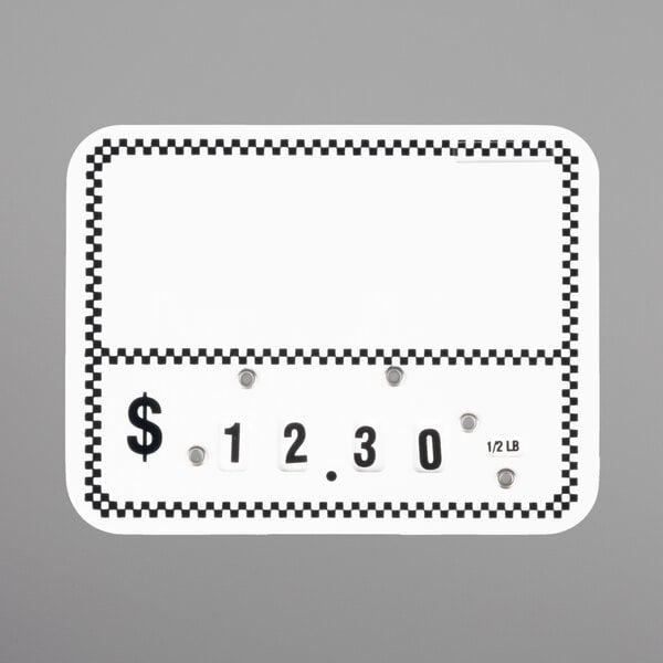 A white deli tag with a black and white checkered border and the price of $1.