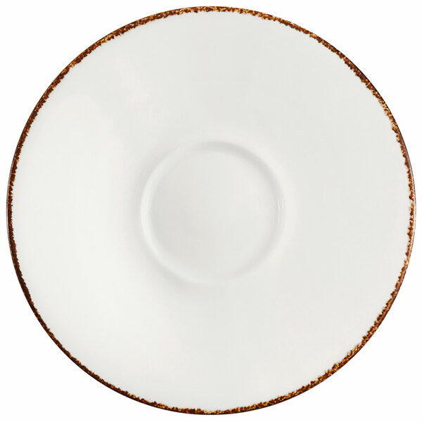 A Fortessa bright white china saucer with an earth hue rim.
