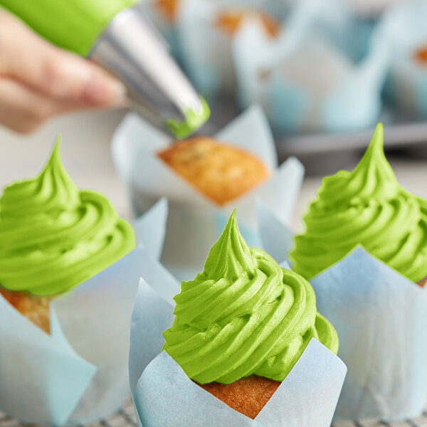 A cupcake with Rich's Allen lime green icing.