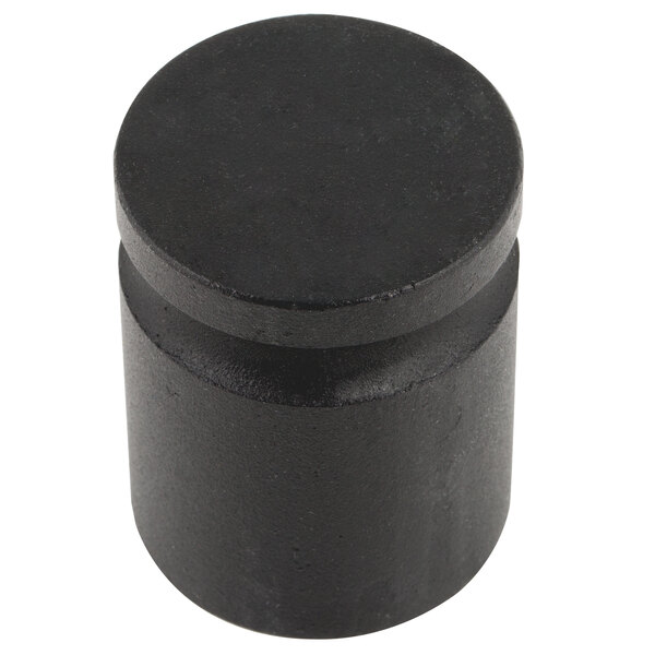 A black cylinder with a round top.