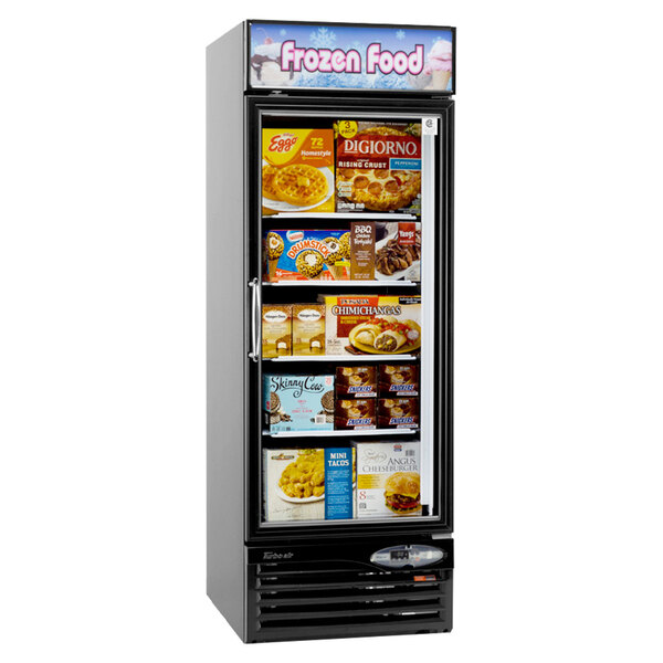 A Turbo Air glass door merchandising freezer with frozen food on shelves.