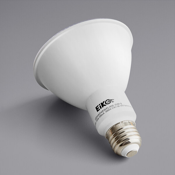 A white Eiko 10 Watt Dimmable Flood LED light bulb with black text on a label.