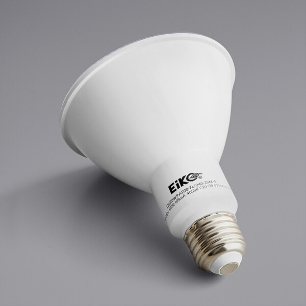 A white Eiko PAR30 LED light bulb with black text on it.