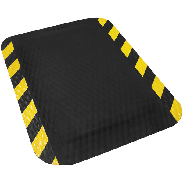 A black Hog Heaven mat with a black and yellow striped border.