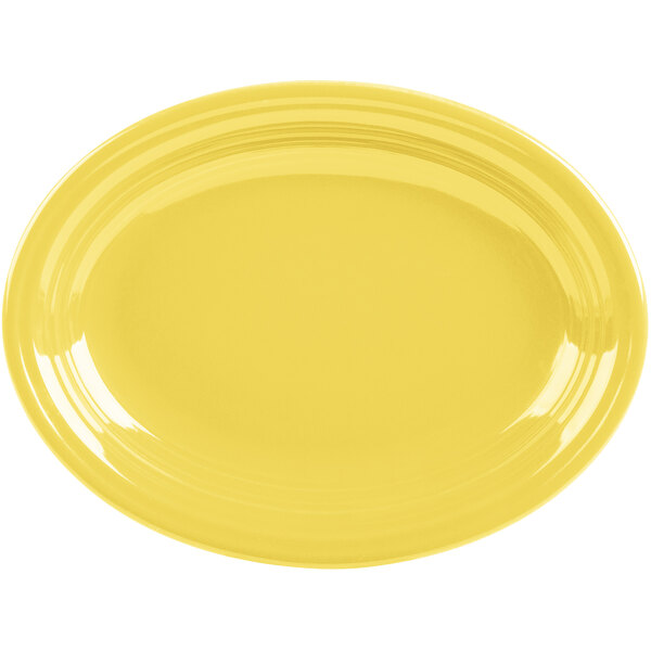 A yellow oval platter with a white border.