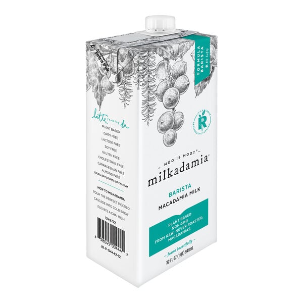 A white carton of Milkadamia Barista Macadamia Milk with a label.