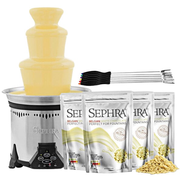 The white package of a Sephra Elite chocolate fountain with a bag of white chocolate chips.