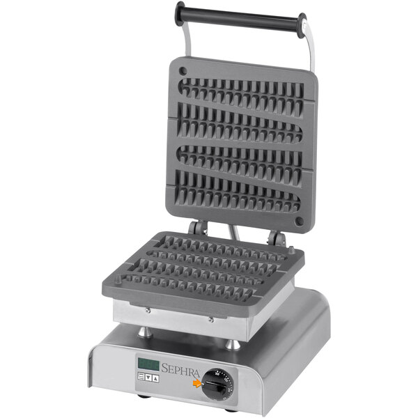 A Sephra commercial waffle maker with a griddle on top.