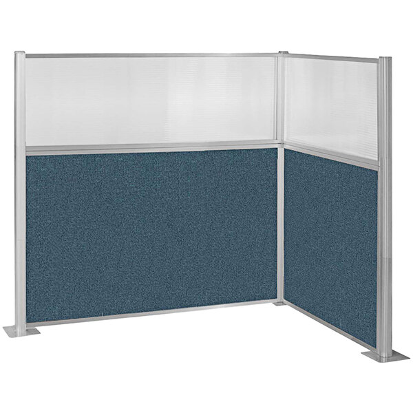 A Versare Hush Panel L-shape cubicle with blue fabric and a window.
