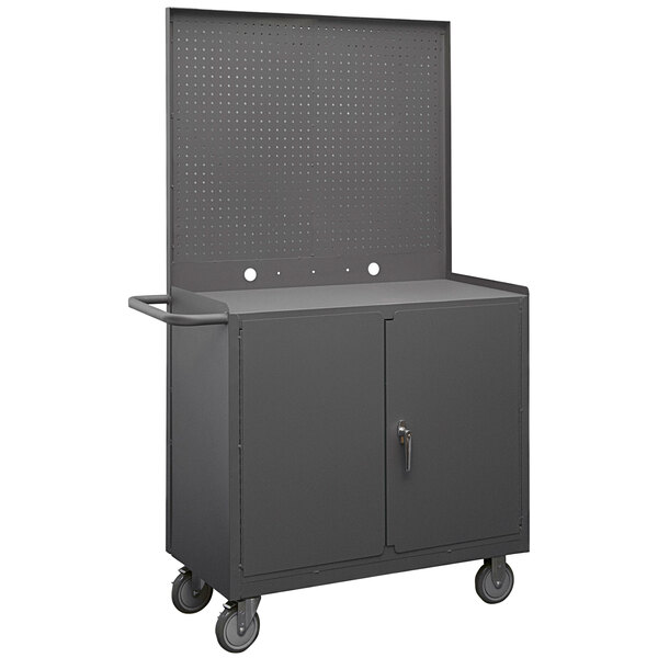 A gray Durham metal mobile workstation with a door and wheels.