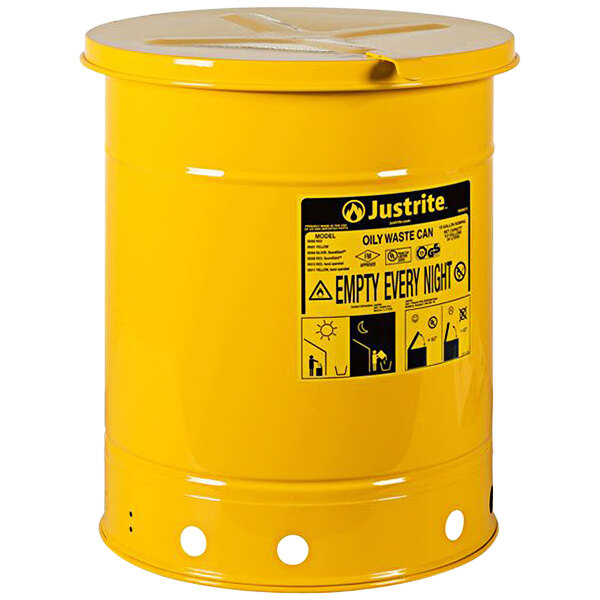 A yellow barrel with a lid and black text.
