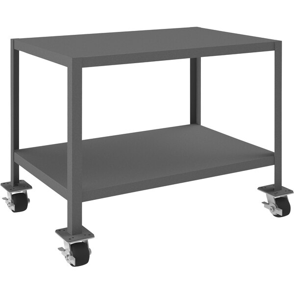 A grey metal Durham machine table with wheels.