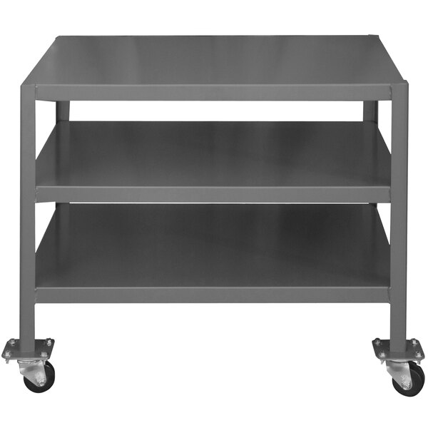 A gray metal Durham machine table shelf on wheels.