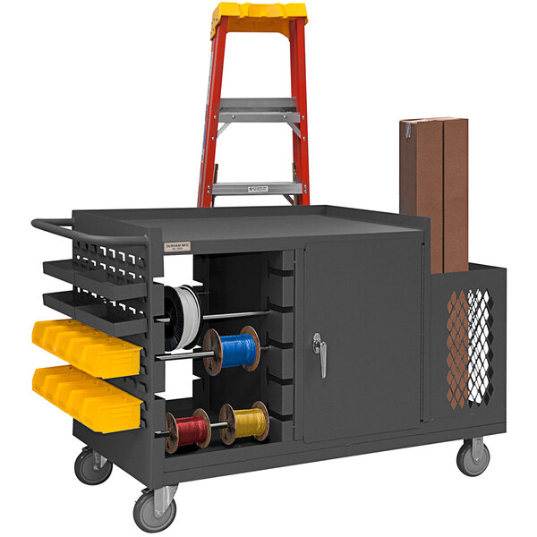 A gray Durham Mfg maintenance cart with a wire spool rack.