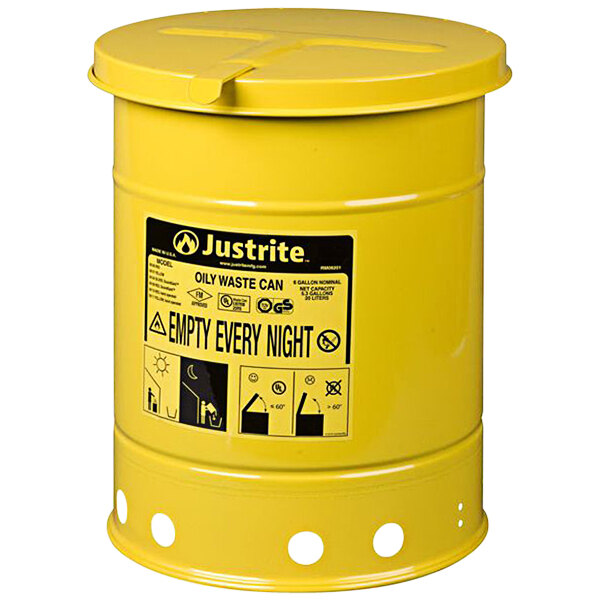 A yellow Justrite barrel with black text.