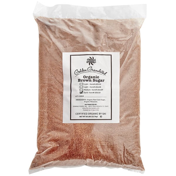 A 50 lb bag of Florida Crystals Organic Dark Brown Cane Sugar.