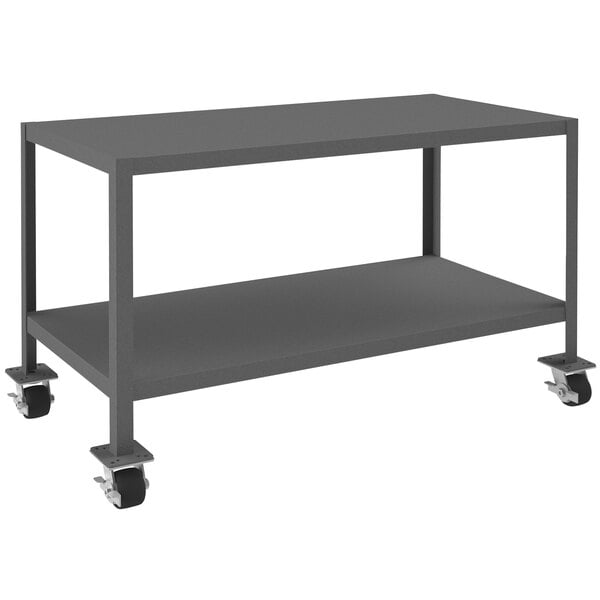 A grey metal table with shelves and wheels.