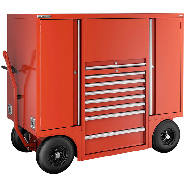 A red Champion Tool Storage mobile workshop with drawers and lockers on wheels.
