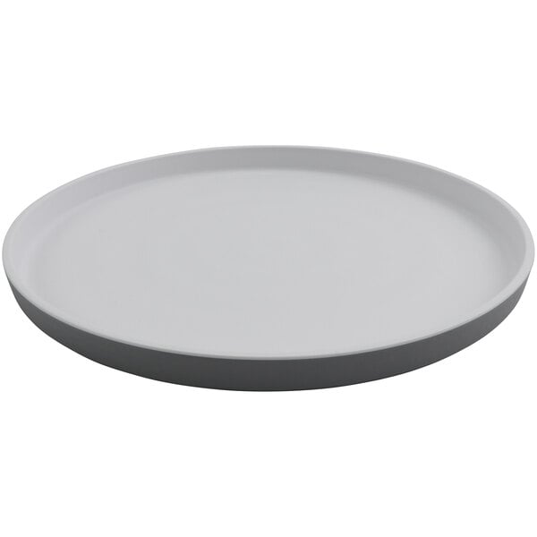 A gray melamine plate with a circular rim.