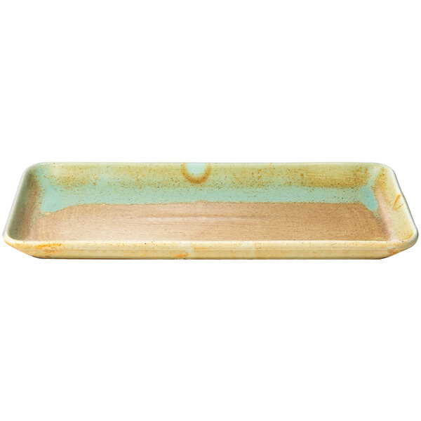 A rectangular Bon Chef Tavola Lago porcelain platter with a light green speckled surface.