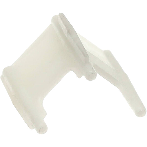 A close-up of a white plastic object with nozzles.