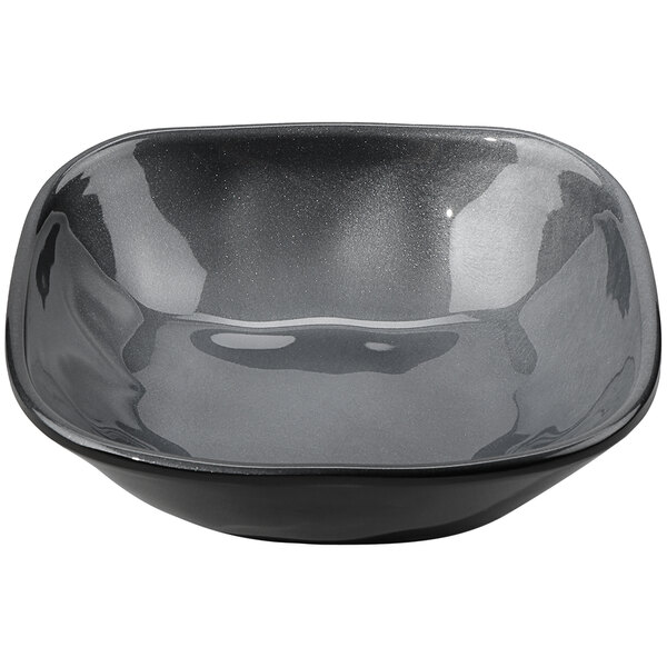 A black irregular square Melamine bowl with a gray rim.