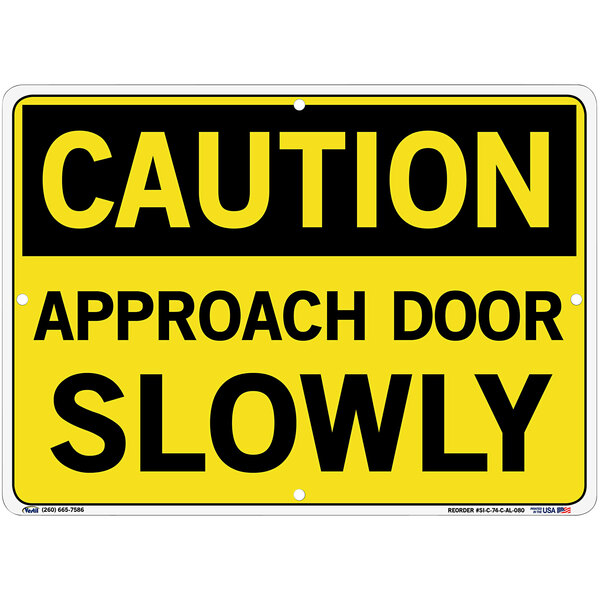 A yellow and black aluminum sign that says "Caution / Approach Door Slowly" by Vestil.