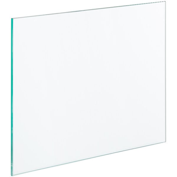 A clear glass shelf with a green border.