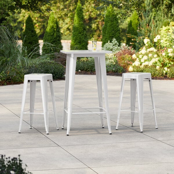 Lancaster Table & Seating Alloy Series 23 1/2" x 23 1/2" Pearl White Bar Height Outdoor Table with 2 Backless Barstools