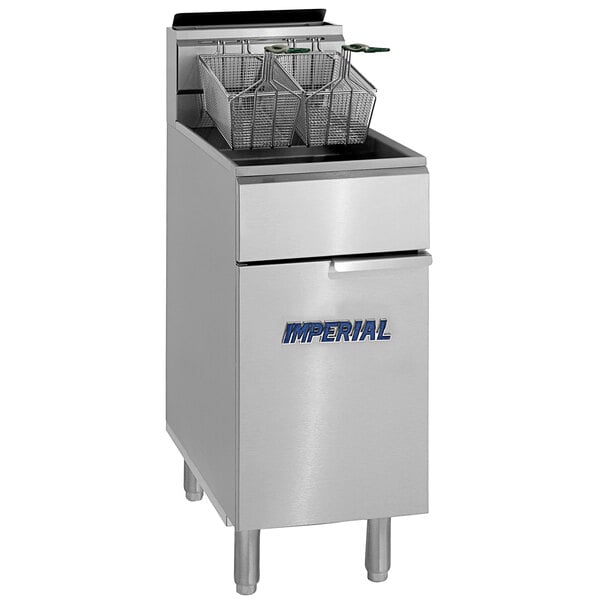 An Imperial Range natural gas fryer with baskets inside.
