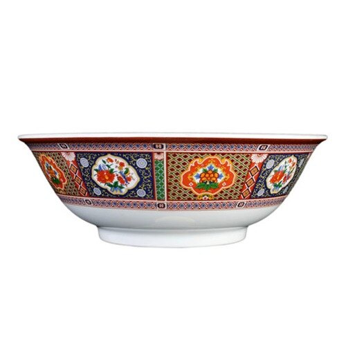 A close-up of a Thunder Group Peacock melamine bowl with a colorful design of a peacock.