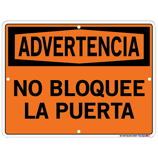 An orange and white Vestil polystyrene sign with black text that says "Advertencia / No Bloquee La Puerta"