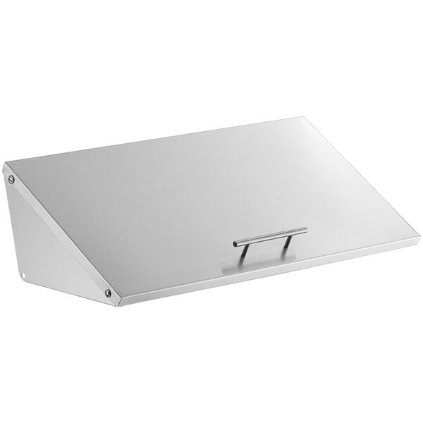 A silver metal lid with a handle for an Avantco prep table.